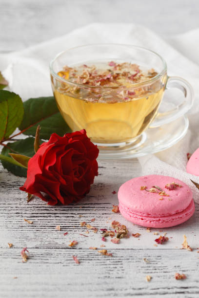 istock Rose petals and pink macaroons. Breakfast concept 639692834