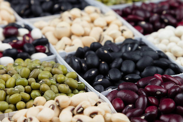 istock Kidney beans background haricot red, black, white, mung   square cells. 639695046