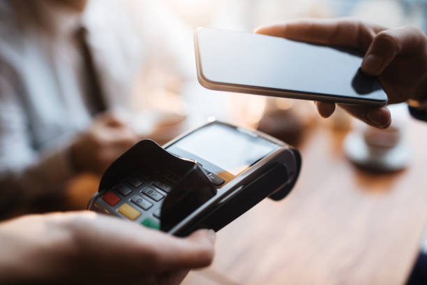 istock Paying with Mobile Phone 639697494