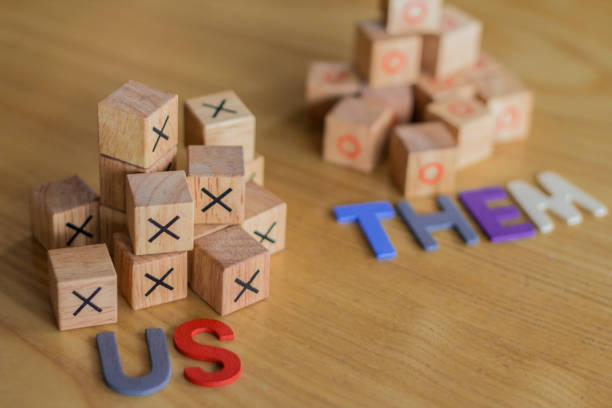 istock Us versus them.  They are different and don't understand. 639698036
