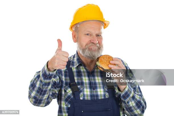 Leckerer Hamburger Zum Mittagessen Stockfoto und mehr Bilder von Bauarbeiter - Bauarbeiter, Burger, Essen - Mund benutzen
