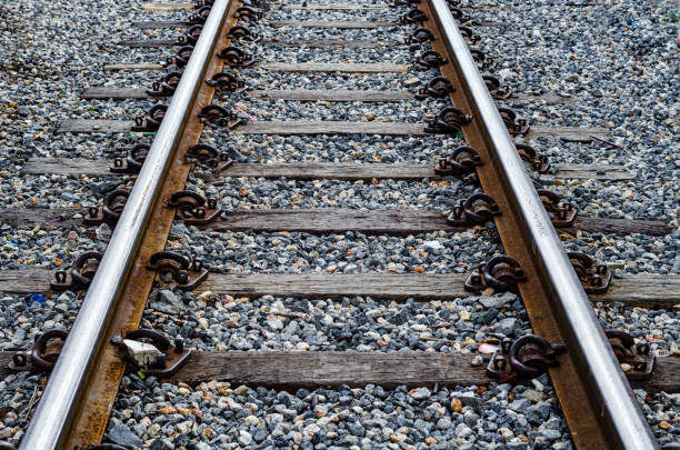 istock Railroad tracks are shown close up 639701182