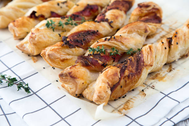 istock Bacon sticks pastry with black sesame and thyme 639701380