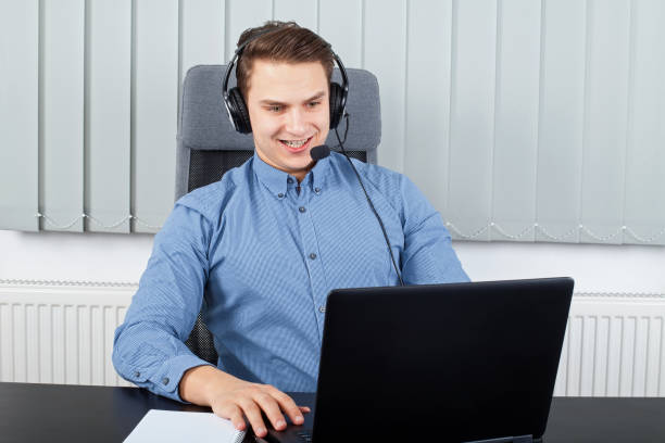 istock Happy businessman having a video-conference 639703648