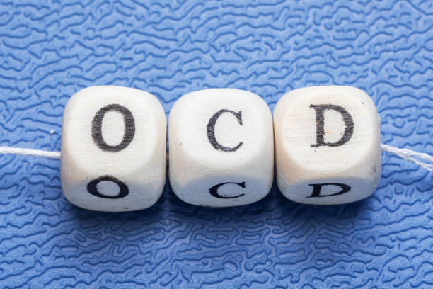 parola ocd (disturbo ossessivo compulsivo) - alphabet blue typescript single word foto e immagini stock