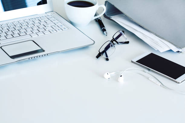 Business table with laptop and coffee