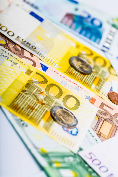 istock Closeup of banknotes and coins 639707424