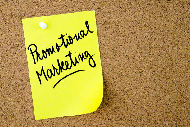 istock Promotional Marketing text written on yellow paper note 639708580