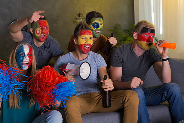 happy friends with colored faces - germany national football team players 個照片及圖片檔