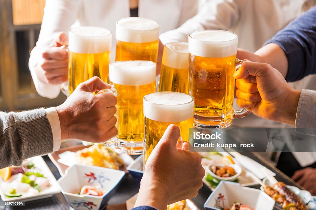 Men and women to be the toast with tavern Celebratory Toast Stock Photo