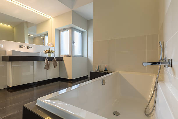 istock Minimalist bathroom with bathtub 639711602