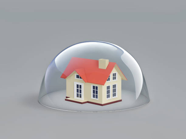 istock Home safety. House under glass dome 639711972