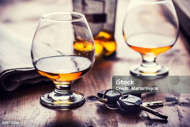 Cup Of Cognac Whiskey Or Brandy And The Keys Car Stock Photo - Download Image Now - Drunk Driving, Misfortune, Car