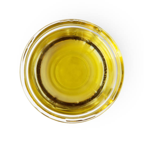 istock Olive oil gravy boat, top view isolated on white 639714858