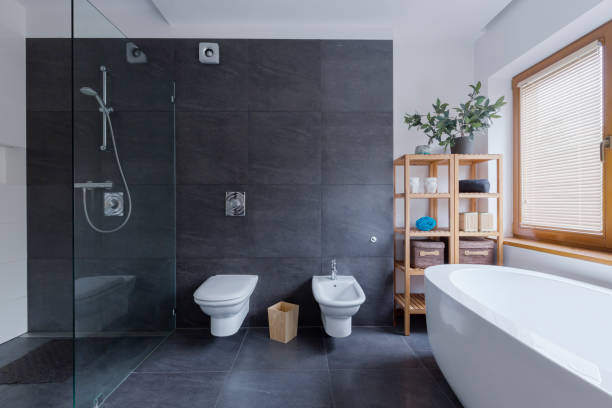 istock Glass shower in travertine bathroom 639716280