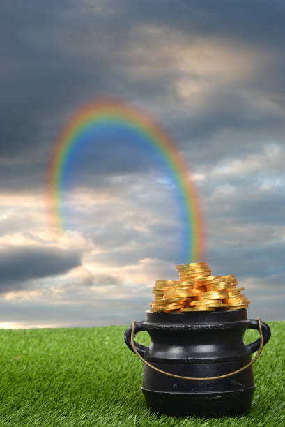 istock rainbow leading to pot of gold 639717480