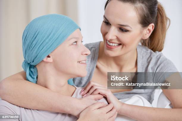 Hopeful Cancer Woman With Friend Stock Photo - Download Image Now - Cancer Cell, Embracing, Patient