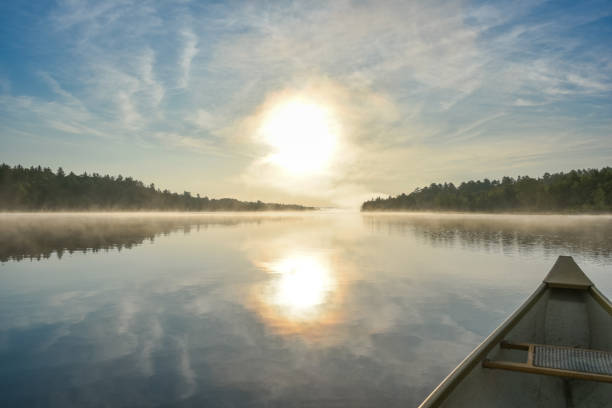 istock Canoeing on a misty summer morning on Corry Lake. 639722368
