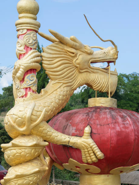 istock gold dragon on pole in Thailand 639724038