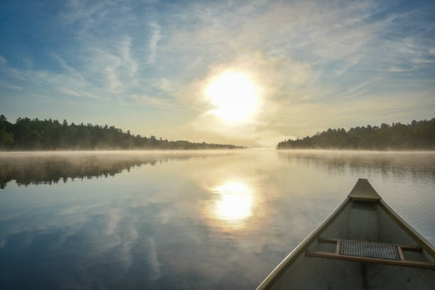 istock Canoeing on a misty summer morning on Corry Lake. 639724160