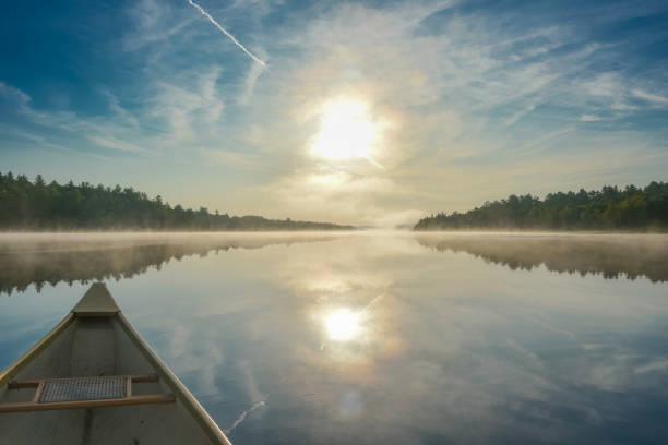 istock Canoeing on a misty summer morning on Corry Lake. 639724558