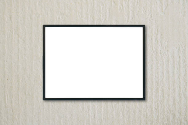 istock Mock up blank frame hanging on wall in room 639724918