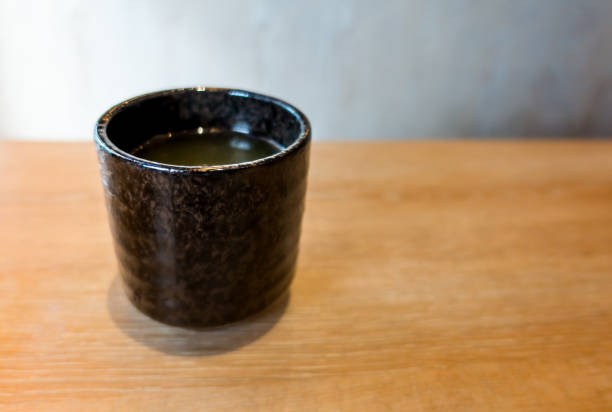 istock Black Japanese Green tea art cup, mug pottery 639728078