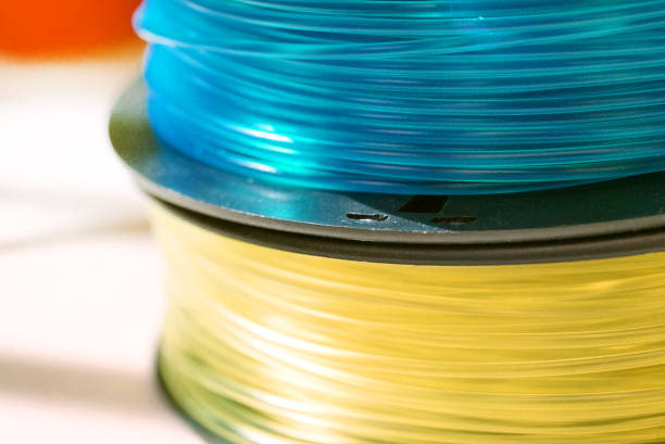 istock yellow and blue 3d filament for 3d printer 639728328