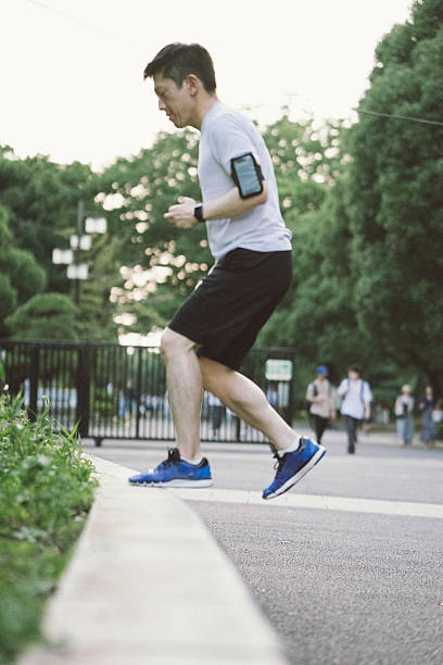 istock Japanese sport man exercising in a park 639728368