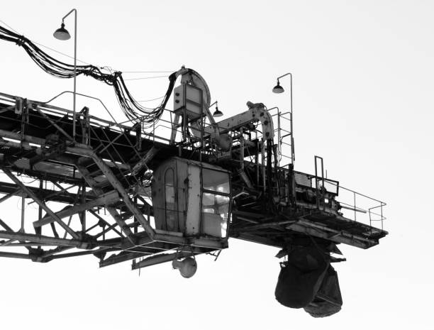 istock Horizontal black and white industrial machinery crane closeup ba 639733832
