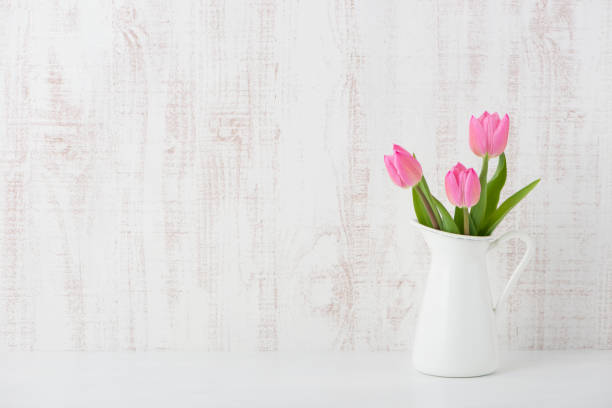 istock Pink tulip in a vase 639734024