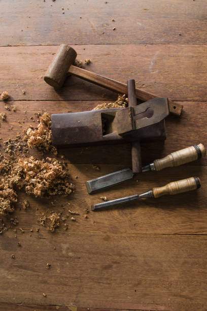 istock The carpenter was working furniture wood in studio , Soft-focus image 639734116