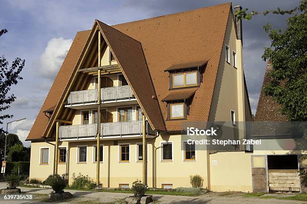 Yellow Villa In Germany Stock Photo - Download Image Now - Apartment, Architecture, Blue