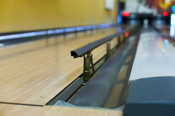 istock Bowling alley background, lane with bumper rails 639736700