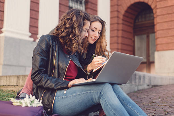 Teenage girls studying