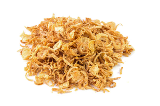 istock Fried onions or crispy fried onion flakes isolated on white 639745146