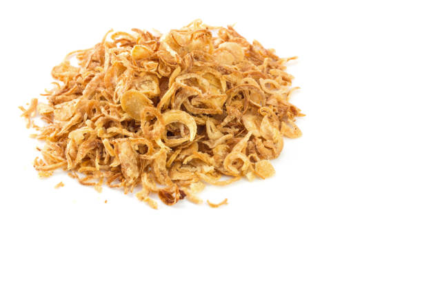 istock Fried onions or crispy fried onion flakes isolated on white 639745196