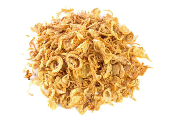istock Fried onions or crispy fried onion flakes isolated on white 639745298