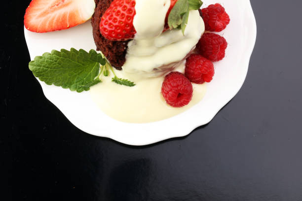 cake for Valentine day with chocolate, white chocolate and strawberries