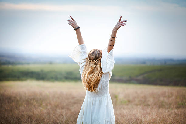 istock Beautiful woman in a meadow 639753564