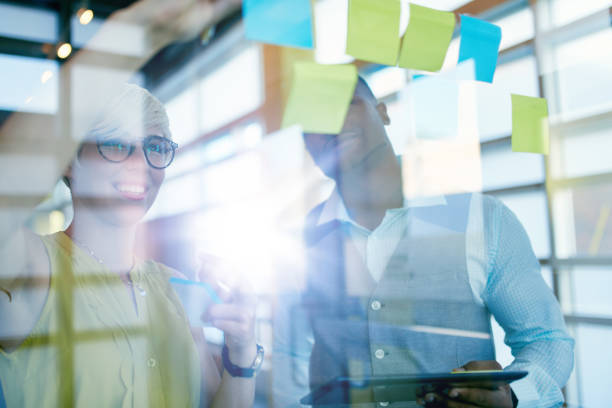 istock Two creative millenial small business owners working on social media 639753878