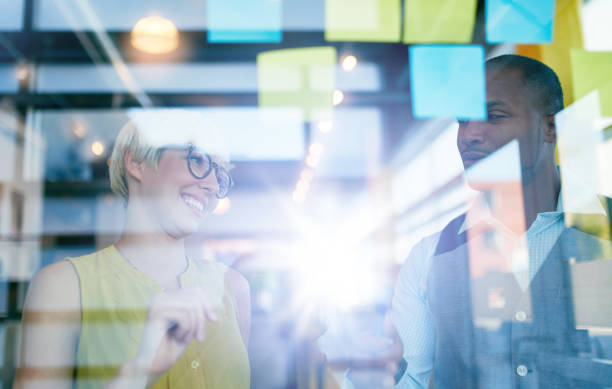 istock Two creative millenial small business owners working on social media 639753902