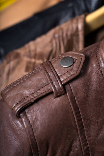 istock Different color leather jacket hanging on rack 639754242