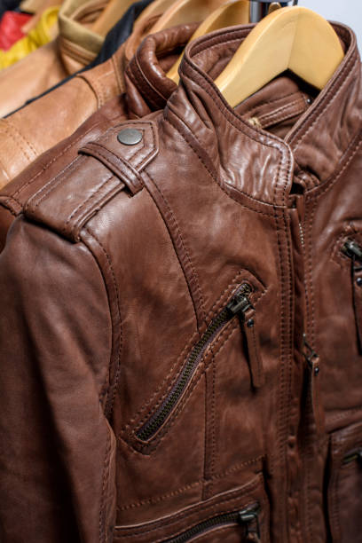 istock Different color leather jacket hanging on rack 639754300
