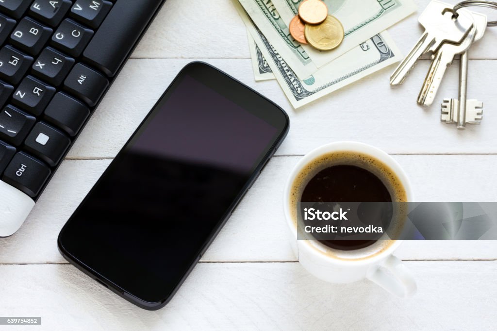 Smartphone cellphone scene top view Smartphone with coffee on wooden table Black Color Stock Photo