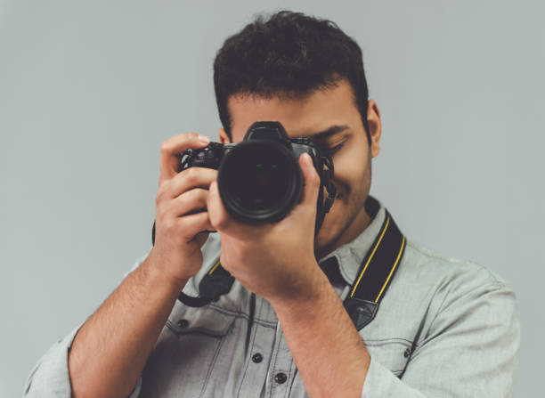 istock Afro American photographer 639755596