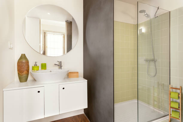 istock Modern Bathroom With Green Tiles 639756674