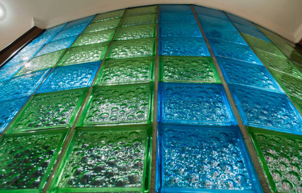 Round bathroom wall from  blue and green glass tile