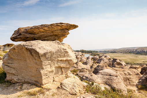 Hoodoo badlands of Writing-on-Stone Provincial Park and Aisinaipi National Historic Site in Alberta, Canada. The area contains the largest concentration of First Nation petroglyphs (rock carvings) and pictographs (rock paintings) on the great plains of North America.