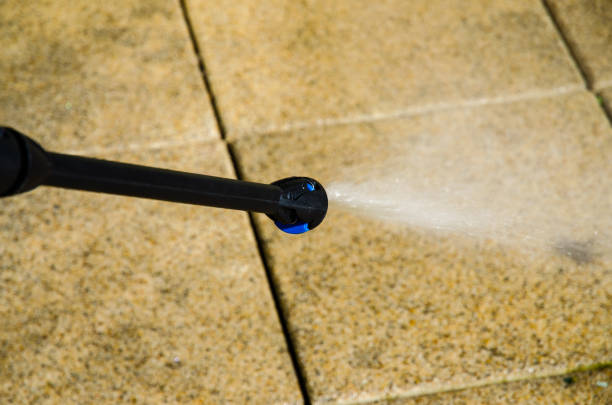 istock cleaning a terrace with water jet 639762378